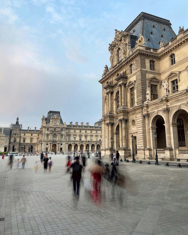 people outside the louvre in paris